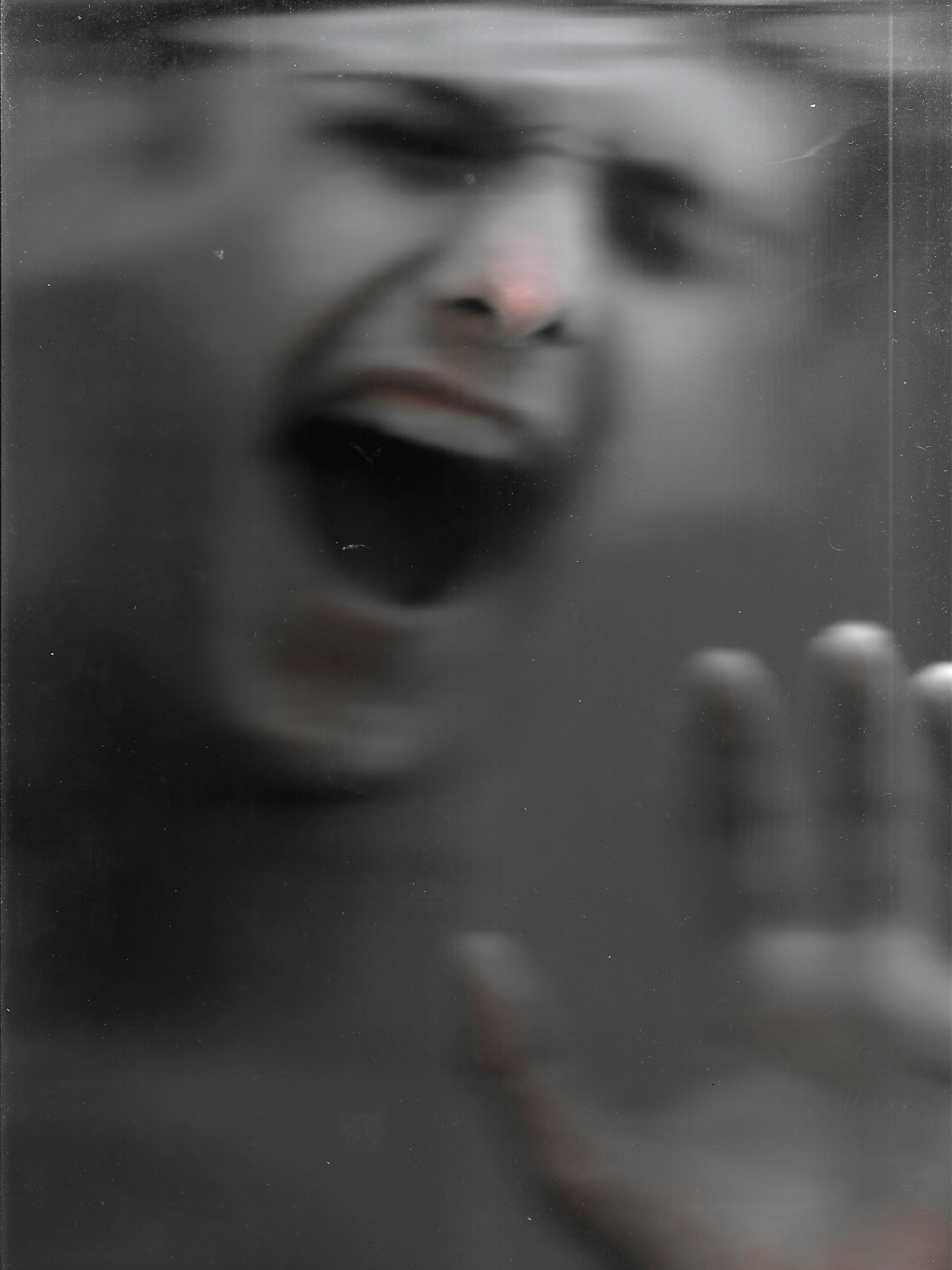 black and white, stylized man screaming
